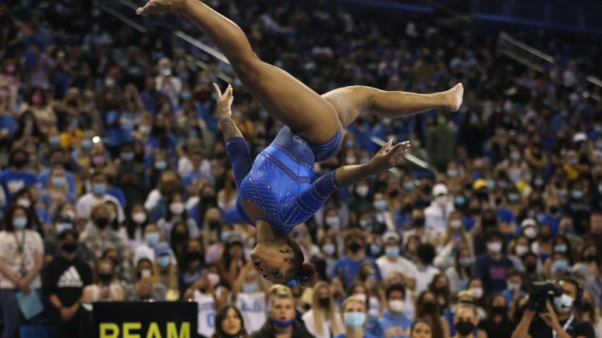 Jordan Chiles of the UCLA Bruins competes on beam against the Arizona Wildcats at UCLA 