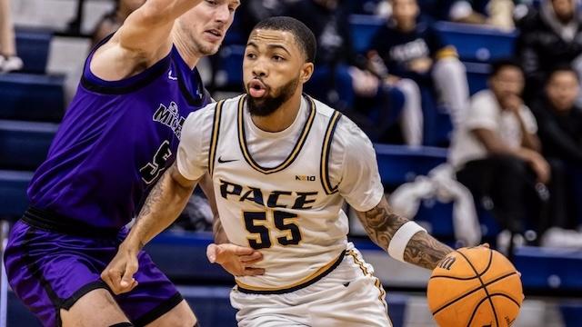 Tray Alexander drives to the hoop for Pace's DII men's basketball team. 