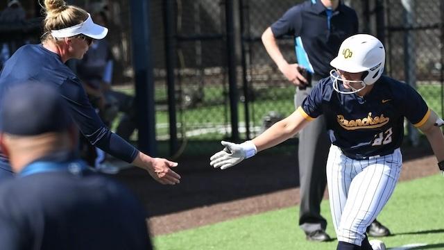 Haley Gallo gives a high five after another DII softball home run.
